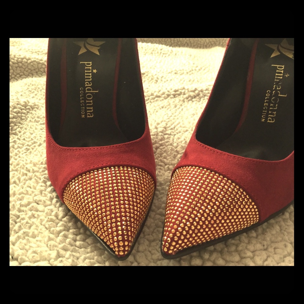 Red suede pumps